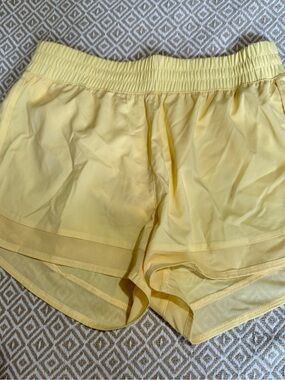 Women's High-Rise Yellow Athletic Shorts ASICS